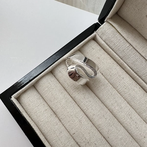 S925 sterling silver S-shaped ring with polished and frosted finish in jewelry box