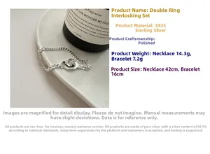 Macro detail of S925 sterling silver Cuban link chain jewelry with engraved lettering