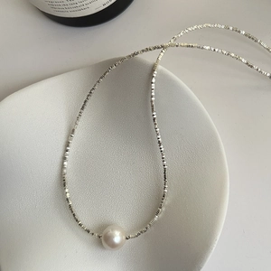 Elegant S925 silver faceted bead necklace featuring a round white Edison pearl on ceramic