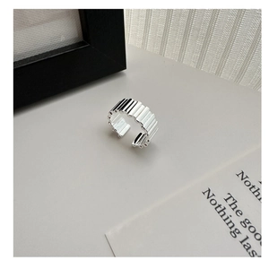 Macro shot of S925 sterling silver ring with vertical stripes and adjustable open band