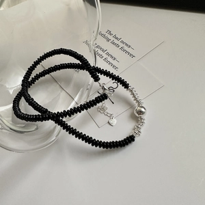 925 sterling silver black onyx beaded necklace with a heart charm and spiral silver accent