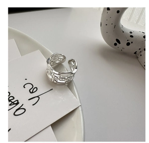 Detailed view of S925 sterling silver three-layer hollow chain ring with adjustable band