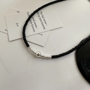 925 silver beaded necklace with black onyx stones and central silver metal accent