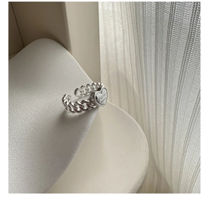 Detail of s925 silver chain ring featuring heart plaque with ONESELF LOVE engraving