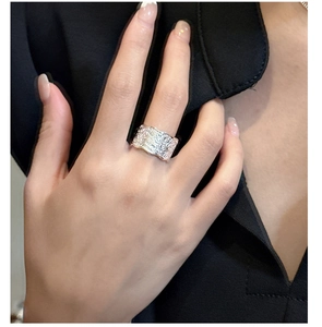 Detailed view of wide S925 sterling silver ring with intricate vintage vine engravings