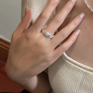 S925 sterling silver heart ring with chain design and Forever Love engraving on finger