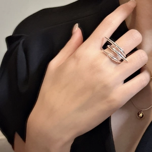 Chic 925 sterling silver multi-layer crisscross ring with edgy spiked accents on hand