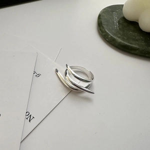 Minimalist 925 sterling silver multilayer crossover ring with a polished silver finish