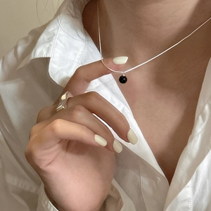 Elegant S925 silver necklace with black agate bead and irregular textured wide silver ring