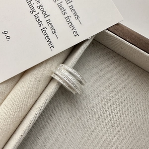 Handcrafted S925 sterling silver multi-layer wide ring with hammered texture on fabric