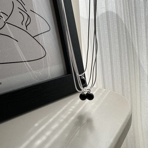 Elegant S925 silver necklace with black agate sphere pendant for minimalist style