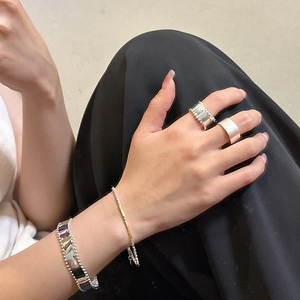 S925 sterling silver minimalist beaded ring and bracelet set worn by a fashion model