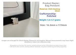 Detailed macro view of S925 sterling silver luggage pendant with ornate scroll patterns