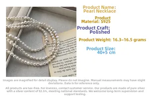 Detail of S925 sterling silver irregular pearl necklace in a beige jewelry tray