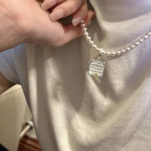 S925 silver pearl necklace featuring a vintage engraved book pendant with gold accents