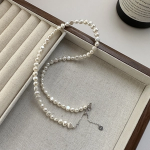 Elegant S925 sterling silver necklace with irregular baroque pearls and heart pendant