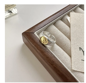 Detail of S925 silver ring featuring gold elk relief and vintage vine engravings