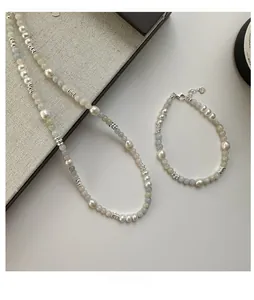 Detailed shot of S925 silver pearl necklace and bracelet set with colorful beads