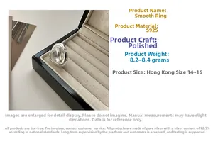 Detailed view of polished S925 sterling silver wide band ring with irregular smooth surface