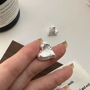 Minimalist S925 sterling silver heart earrings with unique irregular texture and matte finish