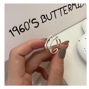 Close-up of double-layered S925 sterling silver minimalist geometric open ring