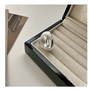 Detailed close-up of S925 sterling silver chunky irregular ring with hallmark engraving