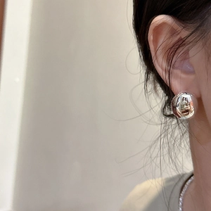 Polished silver oval stud earrings for women featuring a minimalist round mirror-finish design