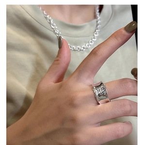 Detailed view of S925 silver wide ring featuring engraved Dream and Love text motifs