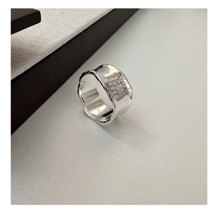 Macro detail of S925 sterling silver ring featuring engraved Dream Come True text