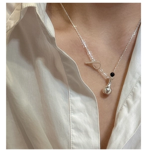 Detail of S925 silver necklace with minimalist perfume bottle pendant and OT clasp