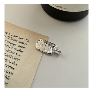Close-up of S925 sterling silver rectangular pendant with handcrafted hammered texture