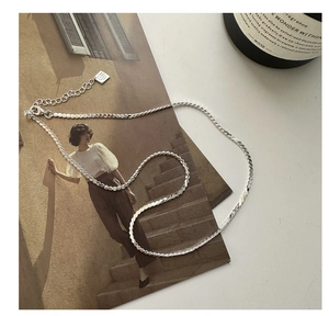Detail of S925 sterling silver chain with lobster clasp and adjustable extension link
