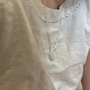 Minimalist S925 sterling silver bean pendant necklace on a delicate chain for women