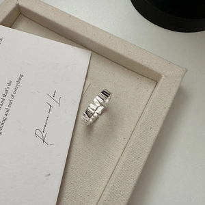 Minimalist S925 sterling silver ring with irregular geometric texture and open design