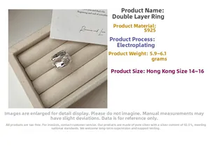 Macro view of S925 sterling silver double-layer ring with textured wavy surface