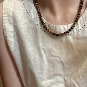 Natural tiger eye beaded necklace in S925 sterling silver worn as a choker