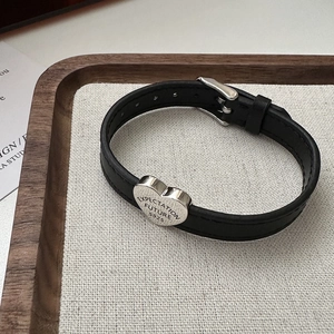 S925 sterling silver heart pendant on black leather strap with buckle closure
