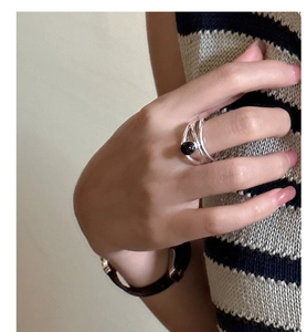 Macro shot of S925 sterling silver multi-strand ring with a black onyx gemstone