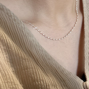 Elegant S925 sterling silver water wave chain necklace with minimalist shimmering spiral design