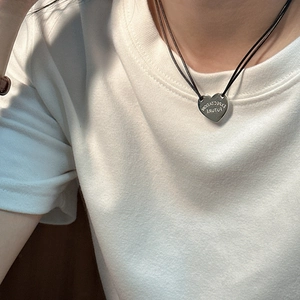 Minimalist S925 sterling silver heart pendant necklace with black cord on model