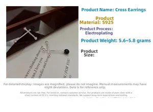 Detail view of S925 silver cross ball earrings featuring a black agate balance design