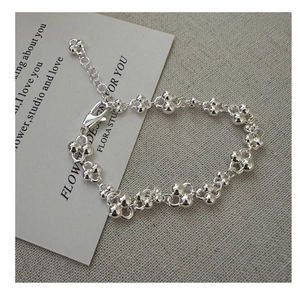 Detail of silver beaded cluster chain necklace with lobster clasp and extension