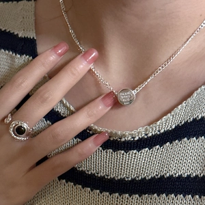 S925 sterling silver necklace with lettered round pendant and stylish wrap ring set