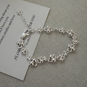 Elegant S925 sterling silver beaded ball necklace with lobster clasp on linen backdrop
