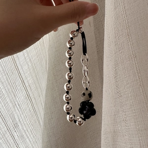 Handheld S925 sterling silver pig nose bracelet with floral charm and spotted stone bead