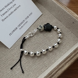 S925 sterling silver bead bracelet with black flower charm and adjustable drawstring cord