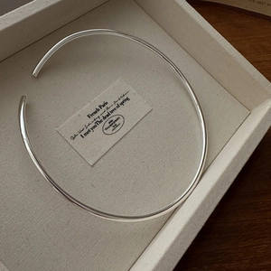 Elegant S925 sterling silver minimalist hollow open choker necklace on a jewelry tray