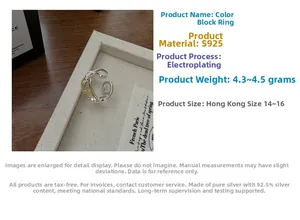 Macro detail of S925 sterling silver anchor chain ring with two-tone gold and silver finish