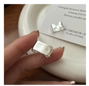 Detailed view of matte S925 sterling silver wide band ring with hallmarked interior