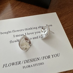 Irregular textured S925 sterling silver square earrings with a unique geometric fold design